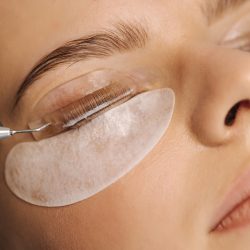 Close-up,Of,Eyelash,Care,Treatment,Procedures.,Beautiful,Female,,Blond,Hair