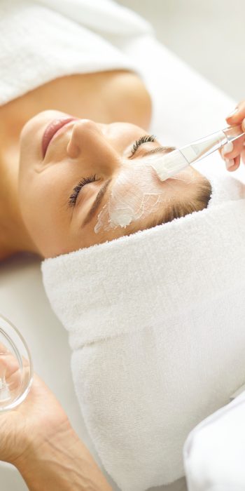 Woman,Enjoying,Facial,Treatment,At,Beauty,Parlor,Or,Spa,Salon.