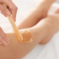 Beautician,Waxing,Female,Legs,In,Spa,Center